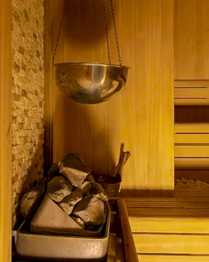 Skilled attendant providing personalized exfoliation and foam massage services at Ametyhst Turkish Bath