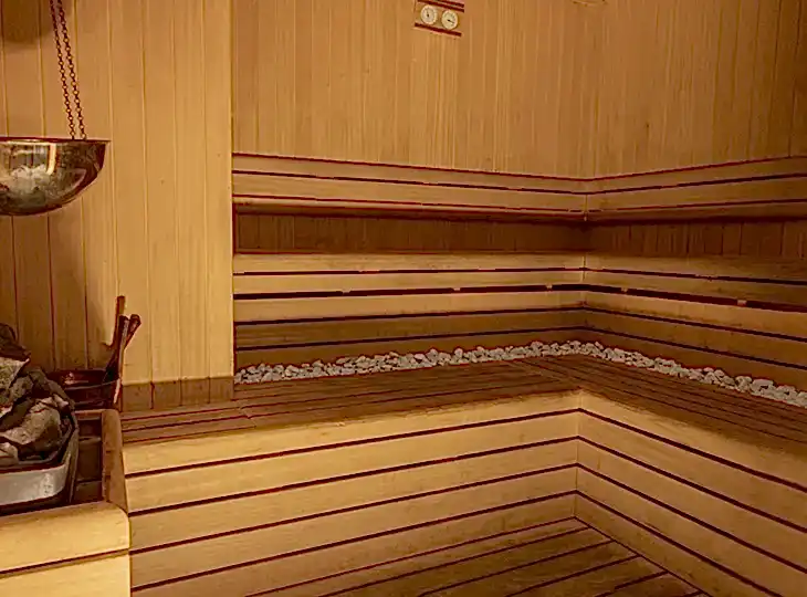Guests enjoying the cleansing steam and heat therapy at Ametyhst Turkish Bath's luxurious hammam.